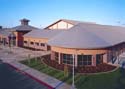 Built complex  - A company installs a metal roof system on a new community center and aquatic complex