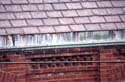 Environmental corrosion of copper - What can slow corrosion on roofs?