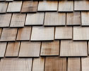 Caring for wood roof systems - Wood shakes and wood shingles require specialized maintenance